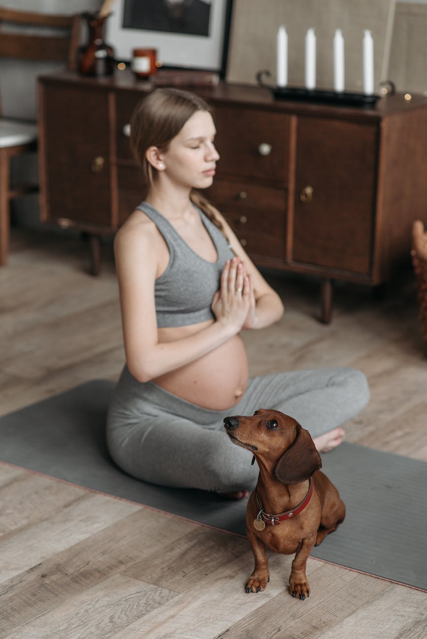 a pregnant woman meditating